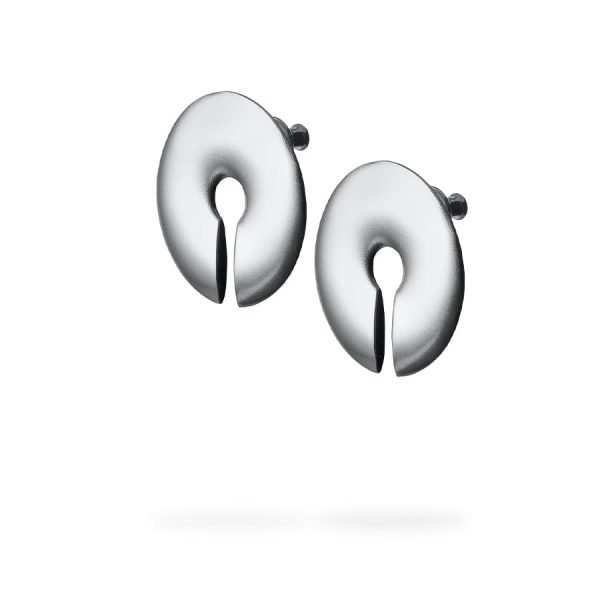 Two pieces of silver earrings on a white background